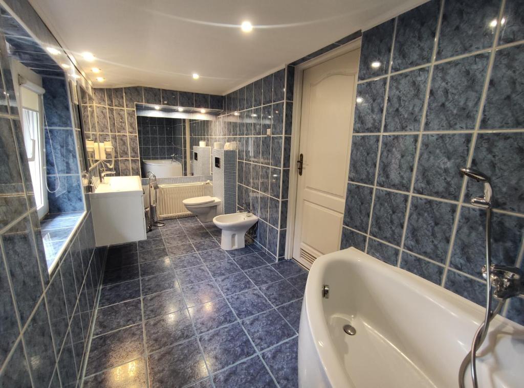 Koupelna v ubytování Hotel Atena