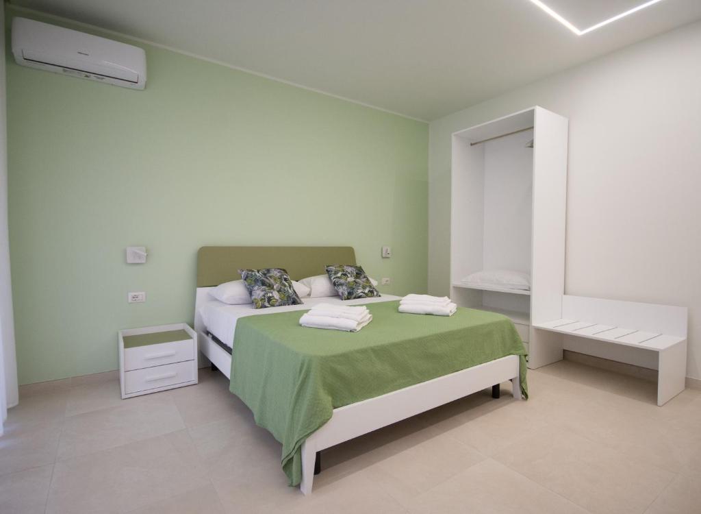 Llit o llits en una habitació de Pasitea Tropea