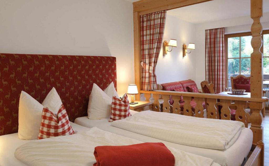 Postel nebo postele na pokoji v ubytování Apartment 10 an der Rottach