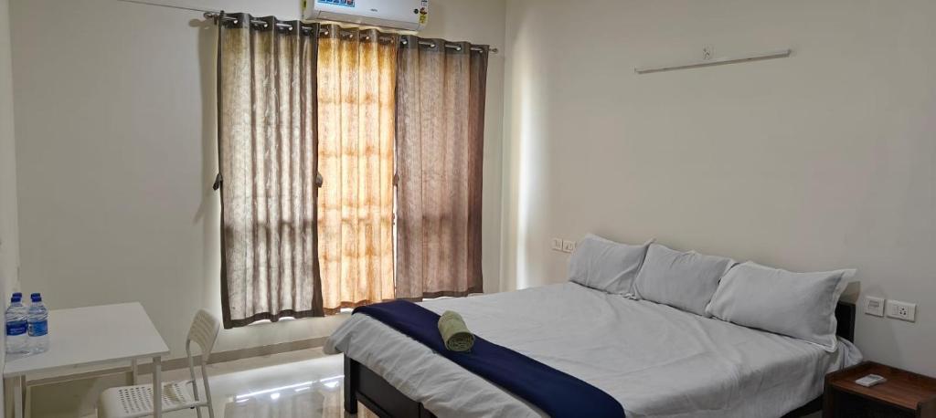 Postel nebo postele na pokoji v ubytování Rockfort stay inn