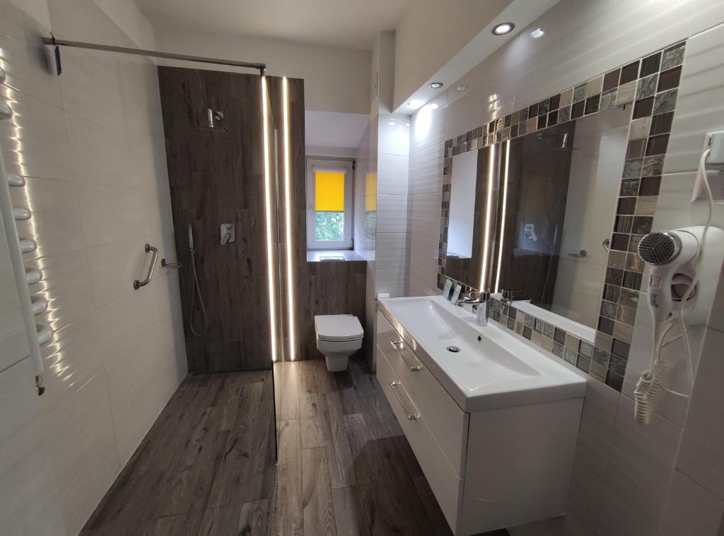 Koupelna v ubytování Hotel Atena