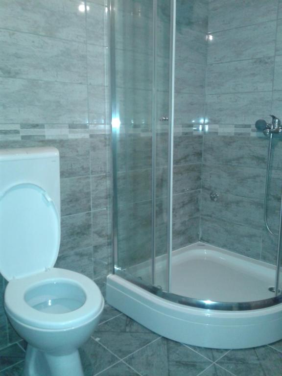 Een badkamer bij Apartments Dora