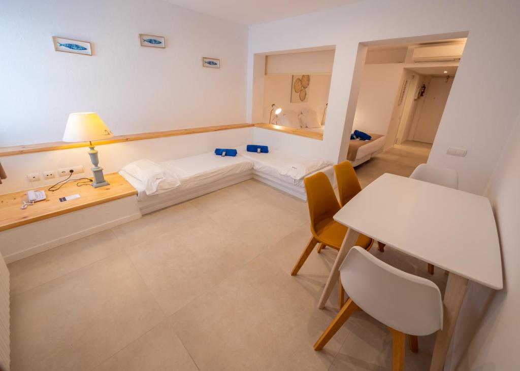 Postel nebo postele na pokoji v ubytování Hotel Calina
