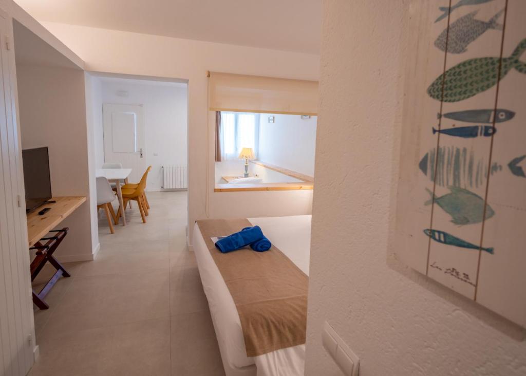Postel nebo postele na pokoji v ubytování Hotel Calina