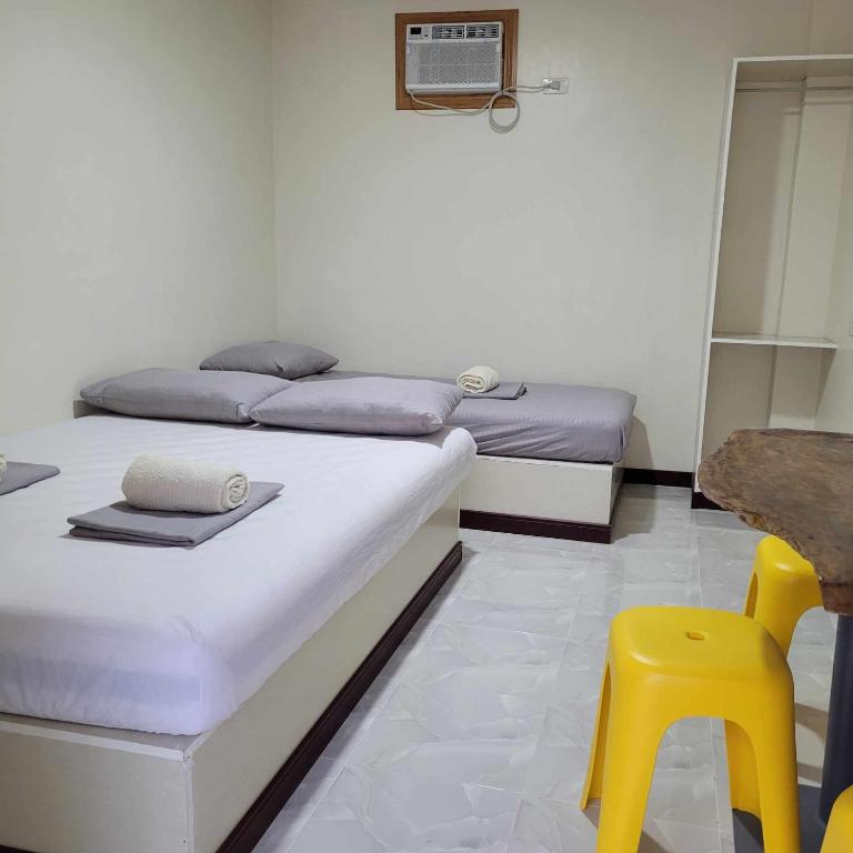 Postel nebo postele na pokoji v ubytování Borj Hotel
