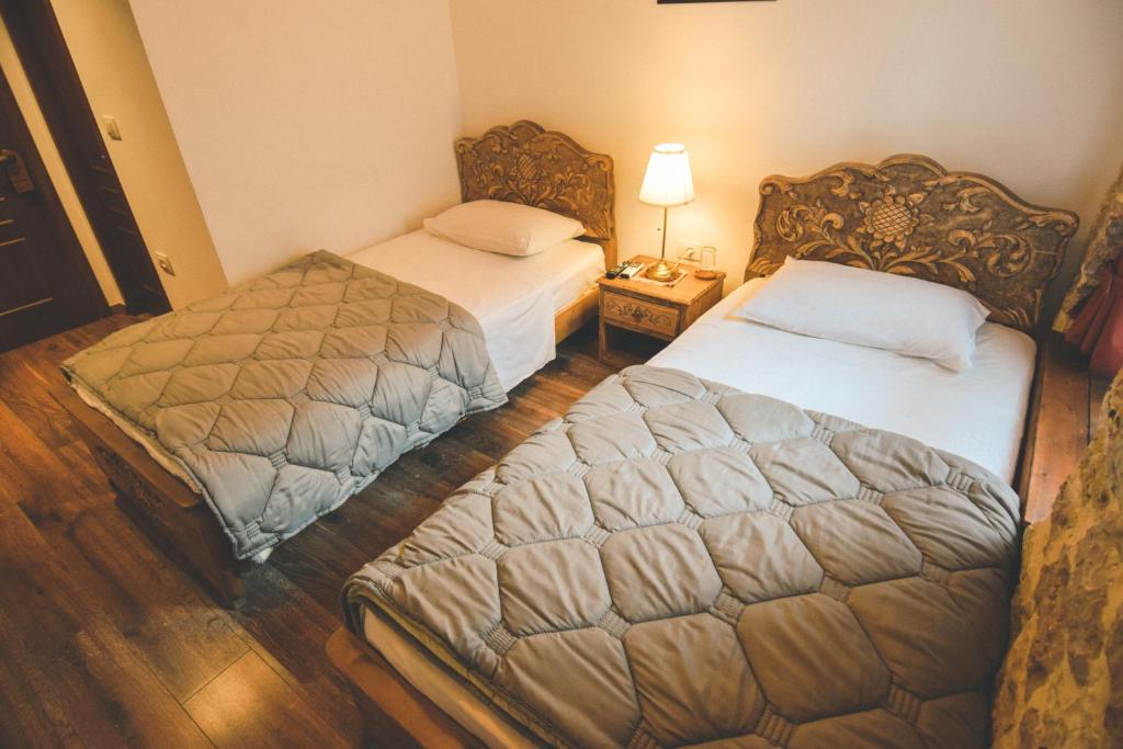 Postel nebo postele na pokoji v ubytování 4 Rooms 1940