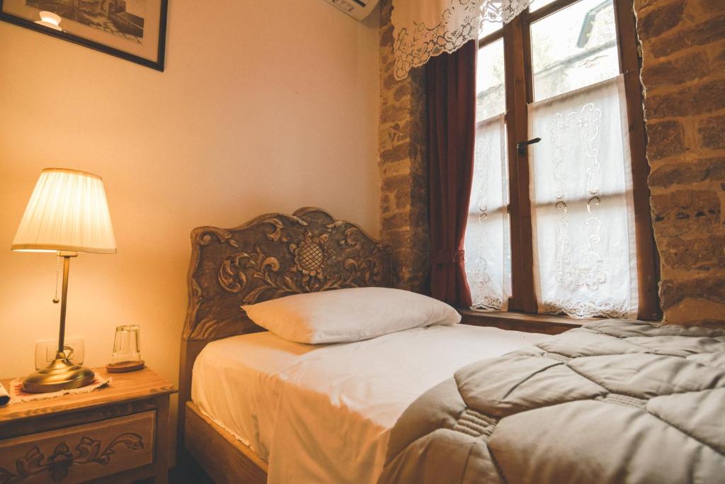 Postel nebo postele na pokoji v ubytování 4 Rooms 1940