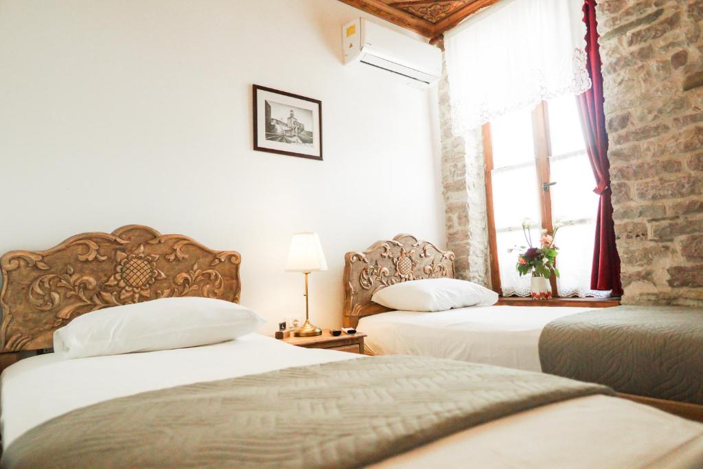 Postel nebo postele na pokoji v ubytování 4 Rooms 1940