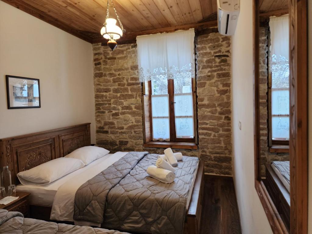 Postel nebo postele na pokoji v ubytování 4 Rooms 1940
