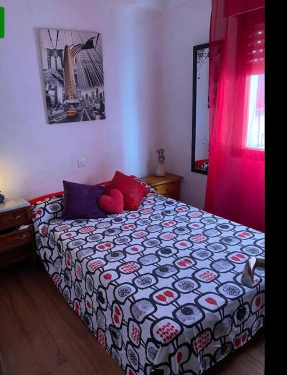 a bedroom with a bed with a stuffed animal on it at Habitación Oviedo 2 in Oviedo