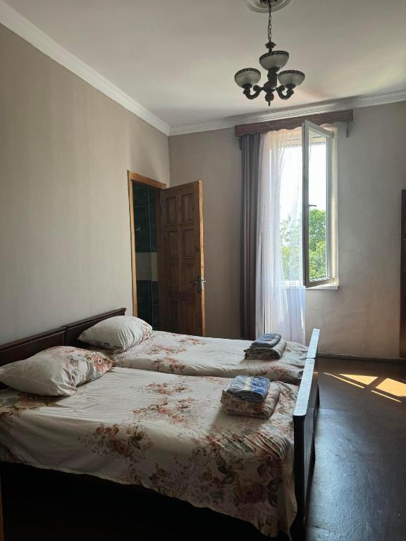 Postel nebo postele na pokoji v ubytování Guest house Gio