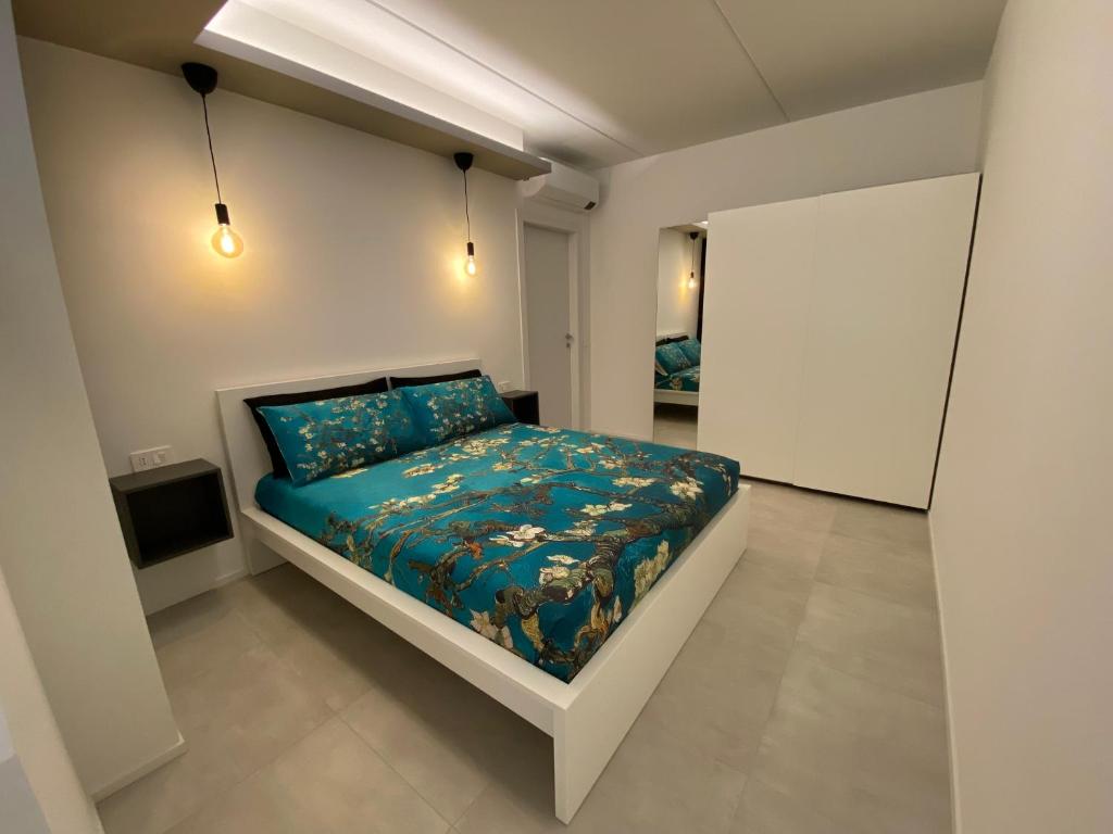 Postel nebo postele na pokoji v ubytování NEW Residenza le Essenze - i 7 Laghi