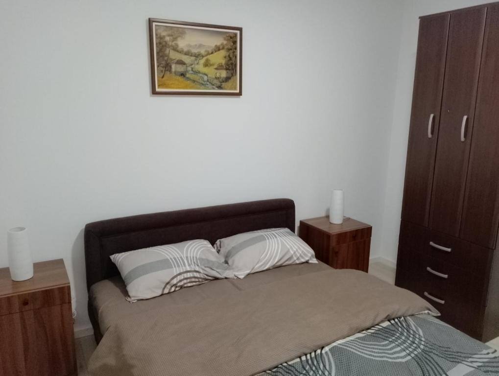 Postel nebo postele na pokoji v ubytování Apartman Petrovic 4