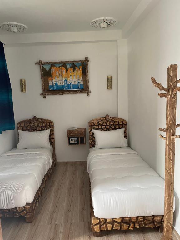 Postel nebo postele na pokoji v ubytování Palacio Del Sol