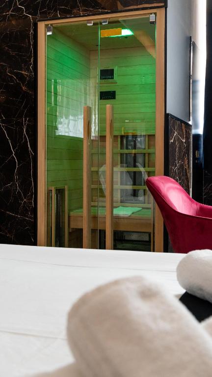 Posteľ alebo postele v izbe v ubytovaní Nuar suite&spa