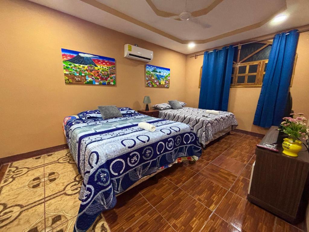 Ένα ή περισσότερα κρεβάτια σε δωμάτιο στο Granados Guest House