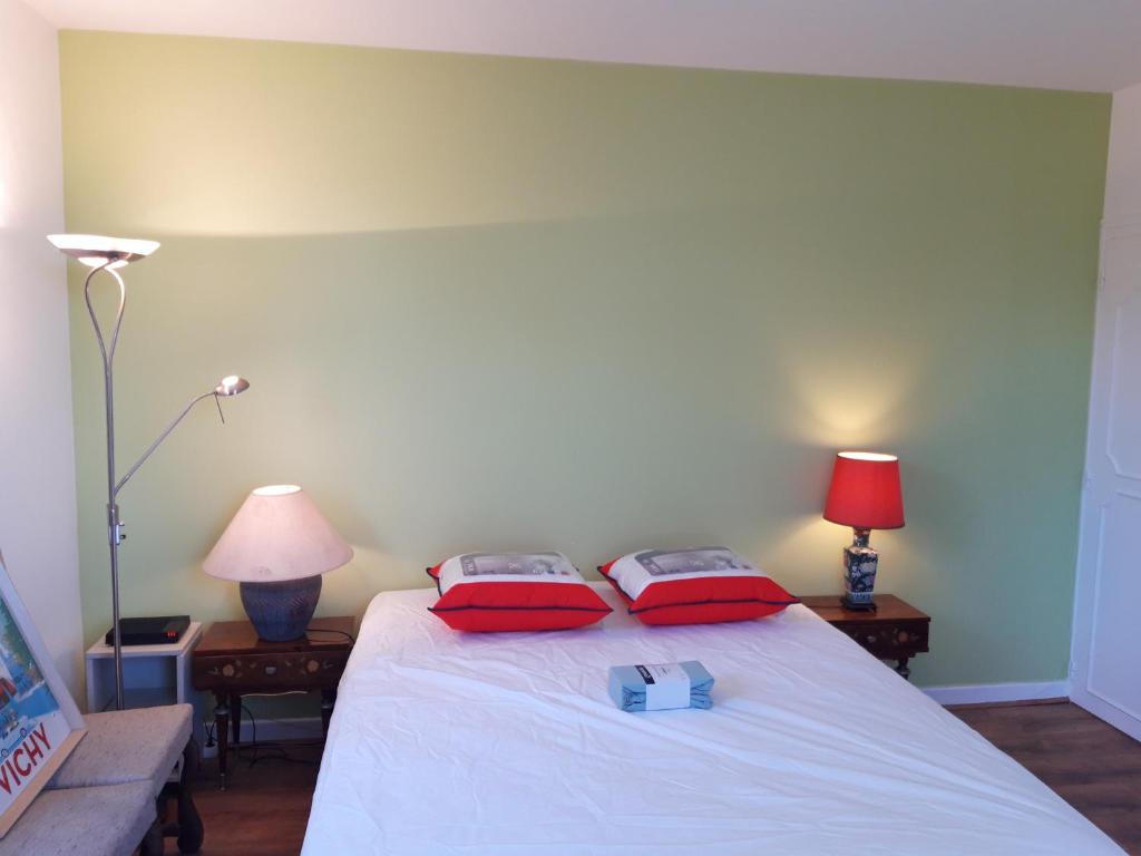 Postel nebo postele na pokoji v ubytování chambre d'hôte