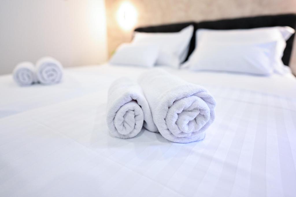Postel nebo postele na pokoji v ubytování Luxury Rooms Pojta
