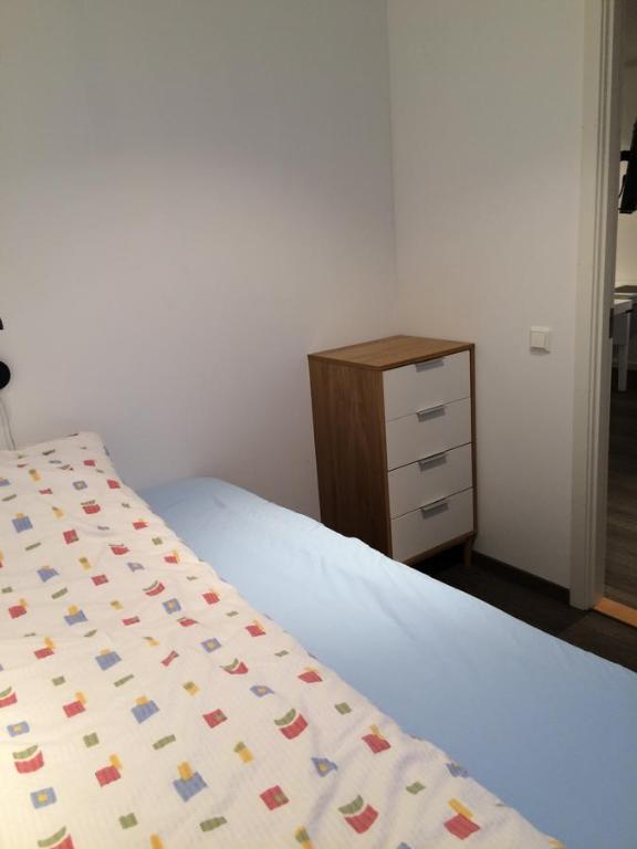 Postel nebo postele na pokoji v ubytování På Taket Overnatting