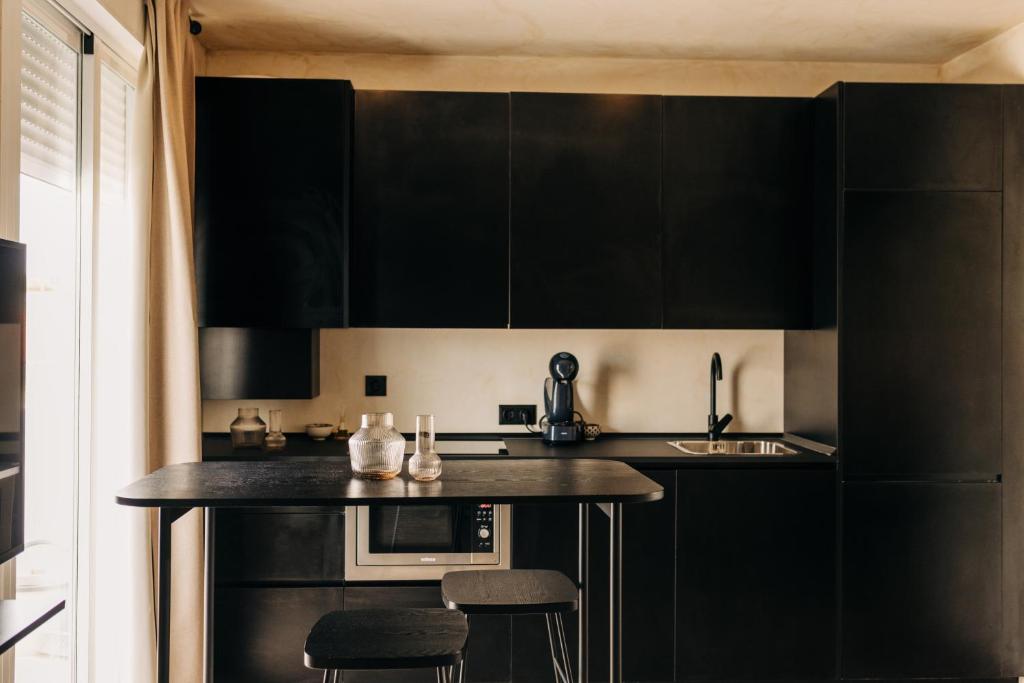 Kuchyň nebo kuchyňský kout v ubytování Edificio Lola 3