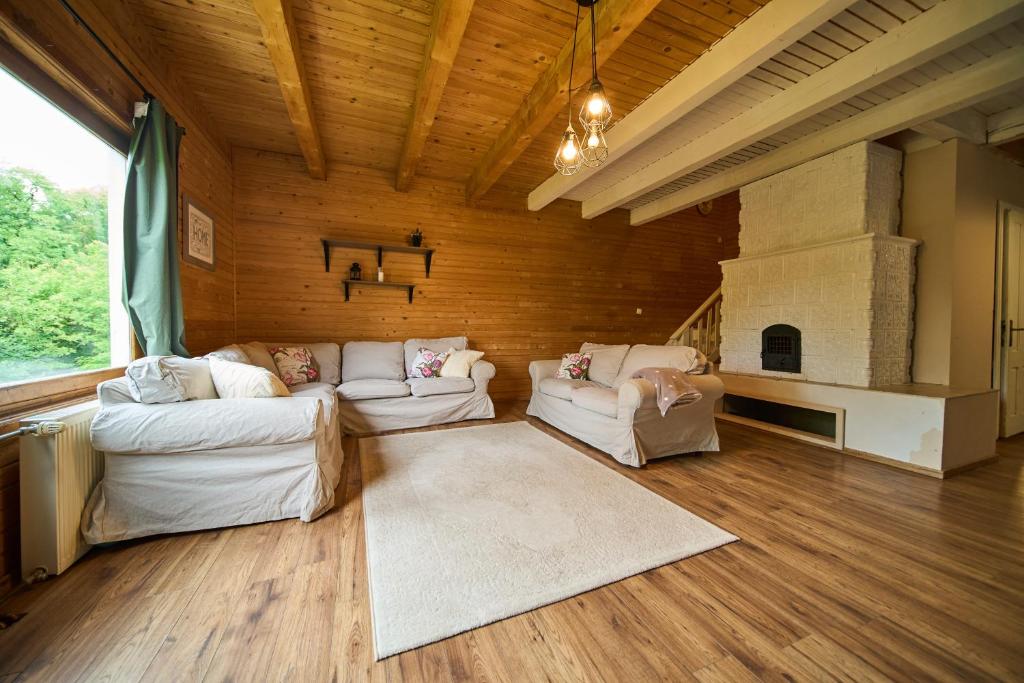 Posezení v ubytování Cosy Forest House