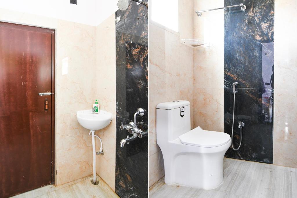 Koupelna v ubytování Super Hotel O MNJ Mansion