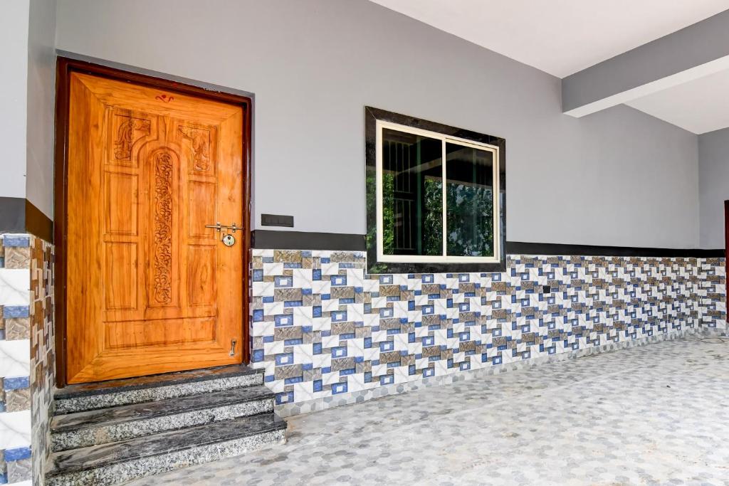 Fotografie z fotogalerie ubytování Super Hotel O MNJ Mansion v destinaci Jānla