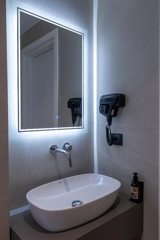 Koupelna v ubytování Arel Hotel