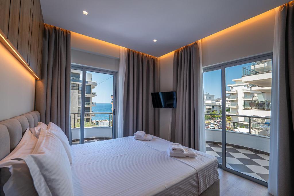 Postel nebo postele na pokoji v ubytování Arel Hotel