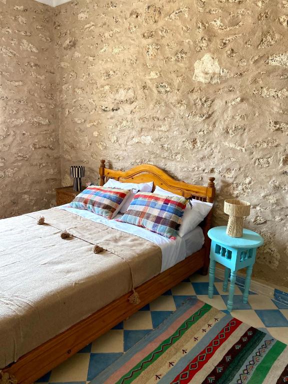 Postel nebo postele na pokoji v ubytování Adam house