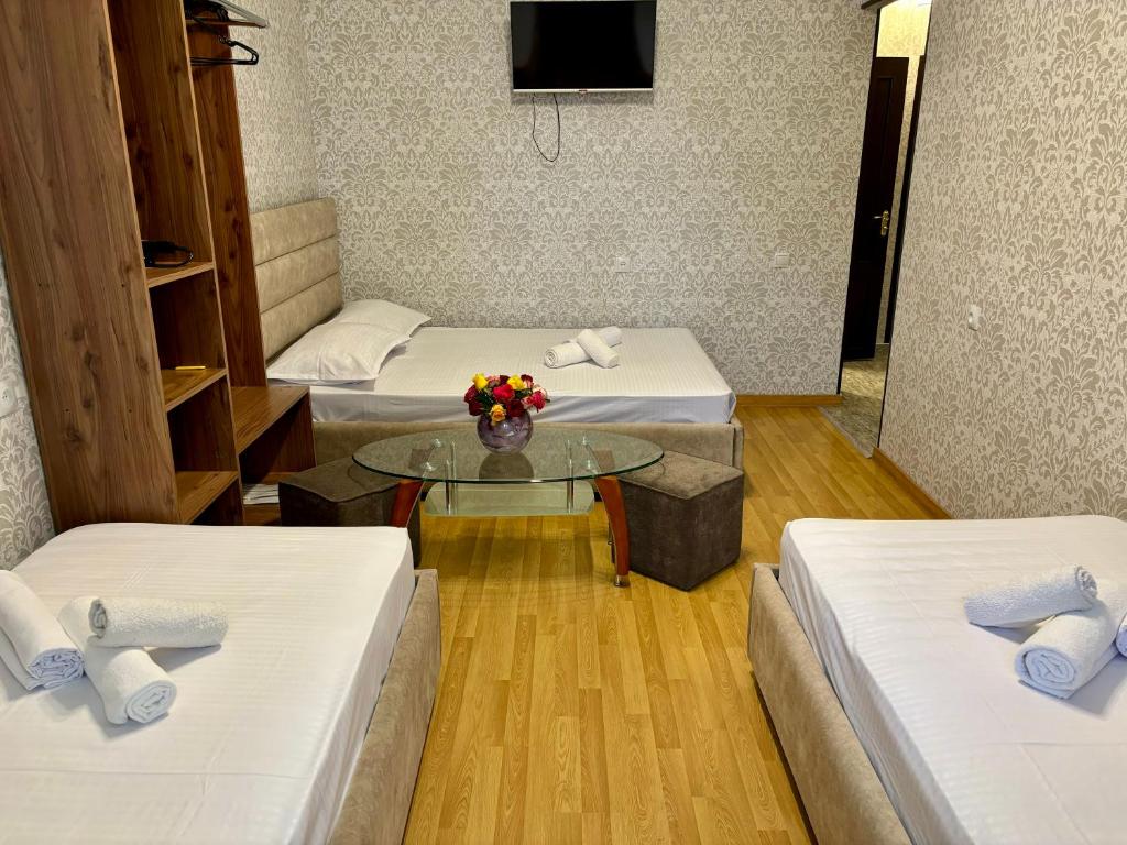 Postel nebo postele na pokoji v ubytování Styopa Hotel
