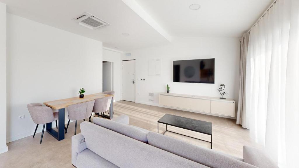 TV a/nebo společenská místnost v ubytování Calypso Residence