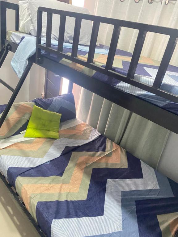 Postel nebo postele na pokoji v ubytování Restfull Transient Inn