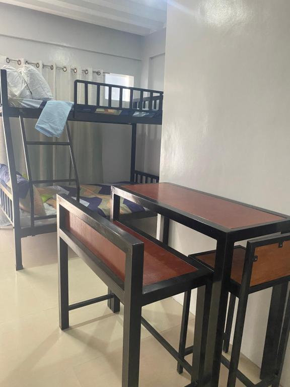 Postel nebo postele na pokoji v ubytování Restfull Transient Inn