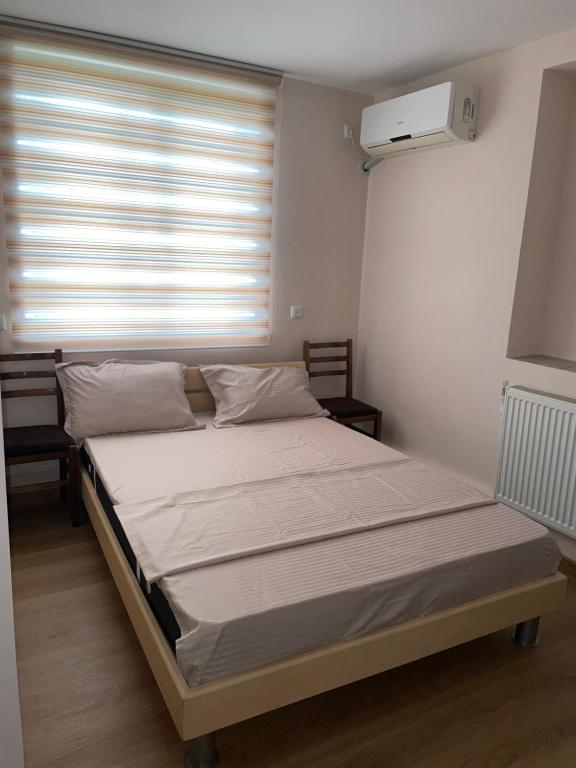 Postel nebo postele na pokoji v ubytování Guest house O'live