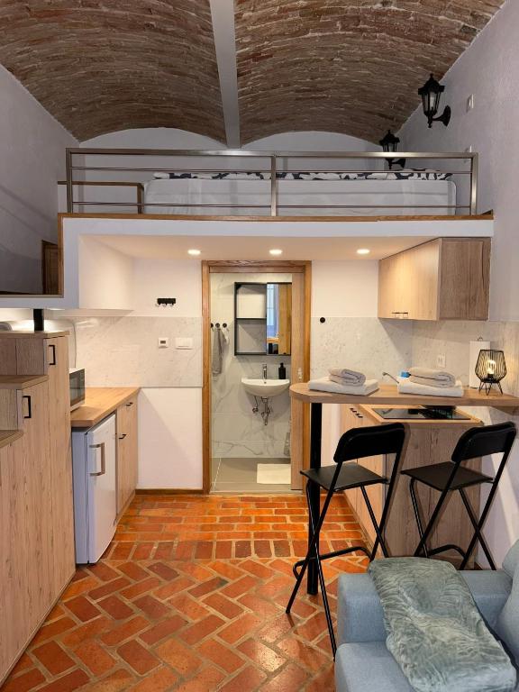 Kuchyň nebo kuchyňský kout v ubytování Zenroom Apartments