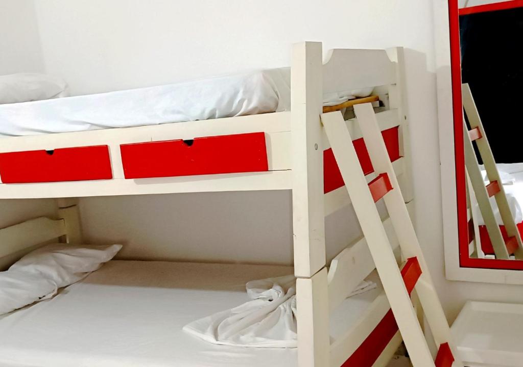 Postel nebo postele na pokoji v ubytování Hospedaje Carmelita Tocaima