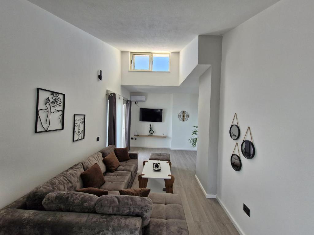Televiisor ja/või meelelahutuskeskus majutusasutuses Luxury Penthouse
