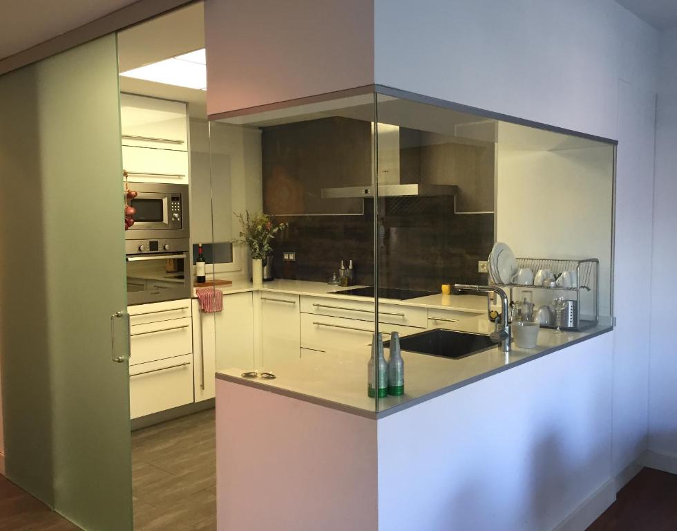 Kuchyň nebo kuchyňský kout v ubytování Apartamento Bahía de Plentzia