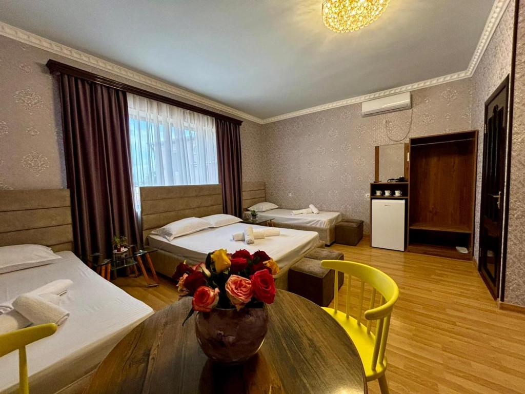 Postel nebo postele na pokoji v ubytování Styopa Hotel