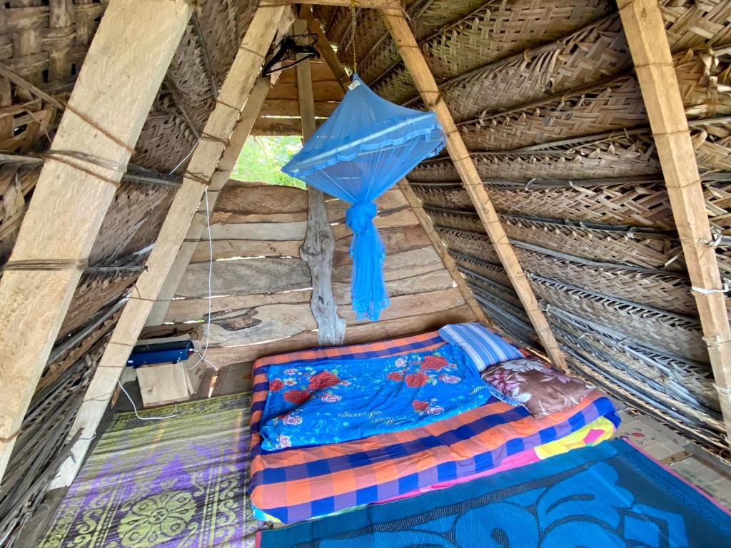 Postel nebo postele na pokoji v ubytování Nilana beach cabana