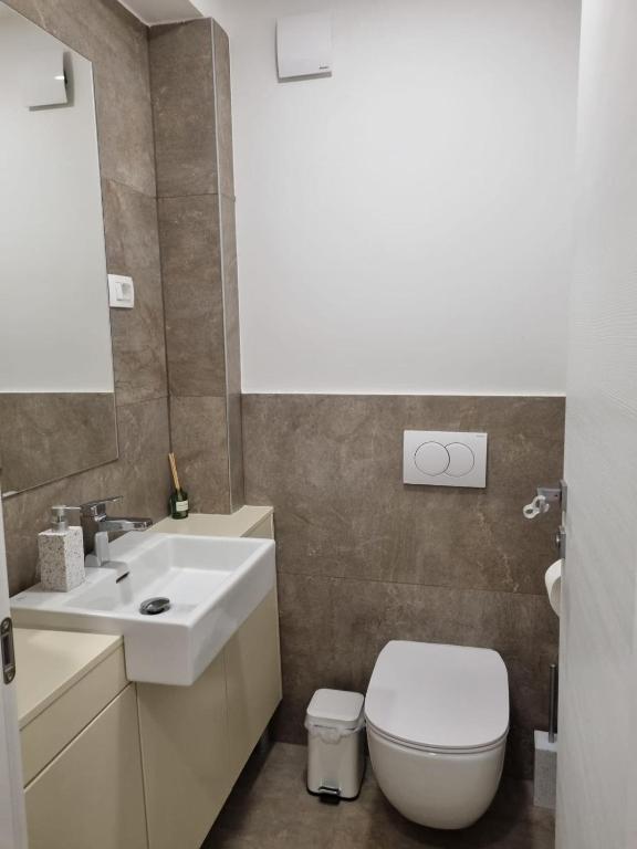 Koupelna v ubytování Calypso Residence
