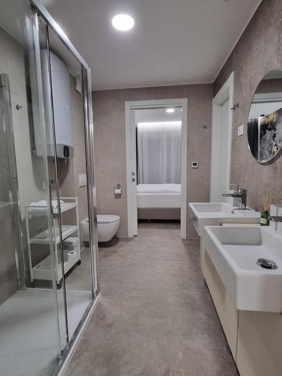 Koupelna v ubytování Calypso Residence