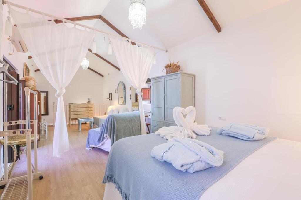 Postel nebo postele na pokoji v ubytování La Casa de Reyes