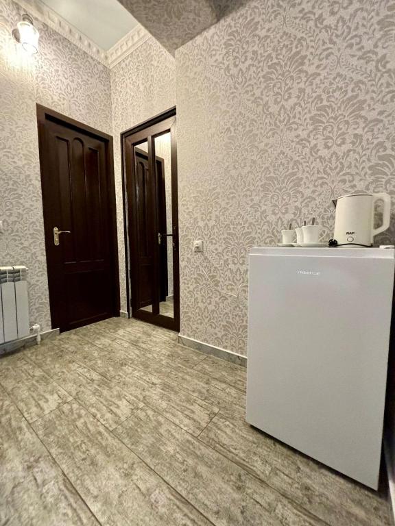 Kuchyň nebo kuchyňský kout v ubytování Styopa Hotel