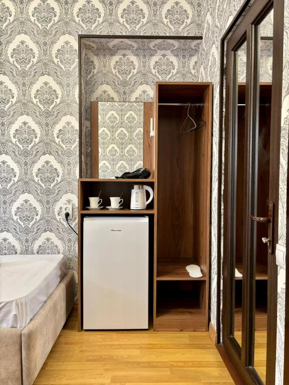 Kuchyň nebo kuchyňský kout v ubytování Styopa Hotel