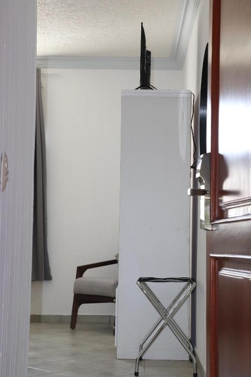 Postel nebo postele na pokoji v ubytování Hotel Plaza San Juan