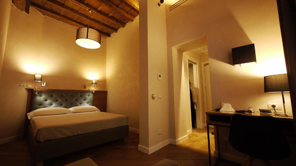 Postel nebo postele na pokoji v ubytování Hotel Elite