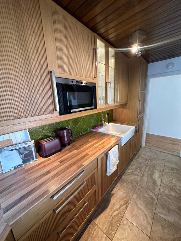 Kuchyň nebo kuchyňský kout v ubytování Nannerls Penthouse