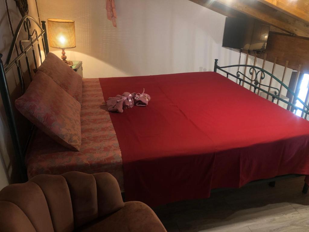 Postel nebo postele na pokoji v ubytování La casetta di Vany